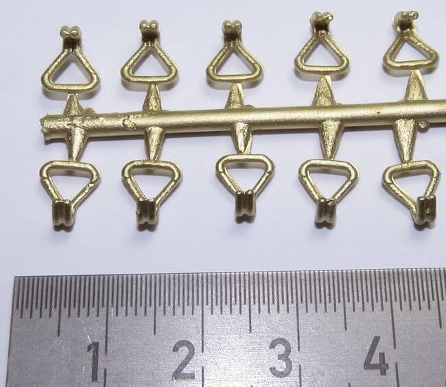 1 Set aus 10 Doppelhaken, groß.Messing-  Feinguss, am