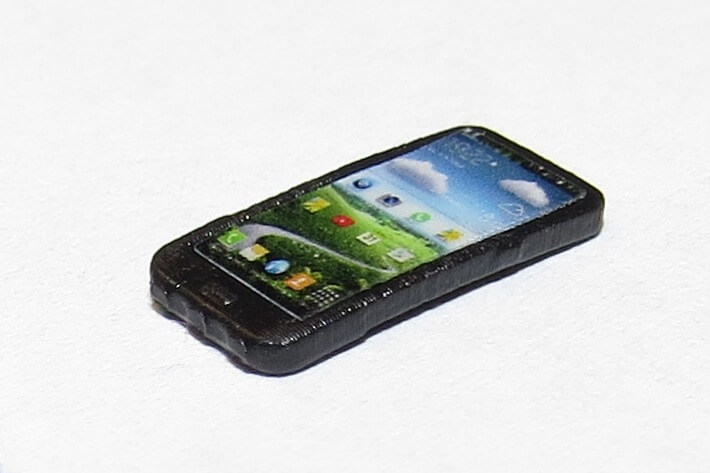 1x Handy (SmartPhone) ca. 12x6mm, Kunststoff, schwarz. Mit  