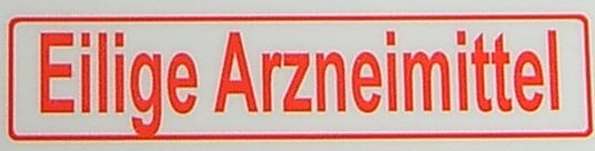 Textschild "Eilige Arzneimi..",rot,1:10  selbstklebende Textschild "Eilige Arzneimi..",rot,1:10  selbstklebende