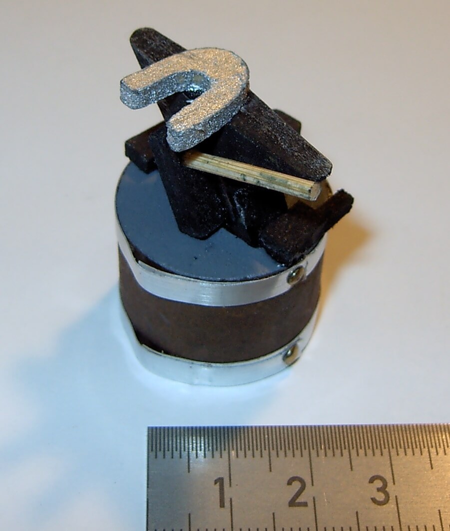 Anvil, about 4cm high 3cm diameter