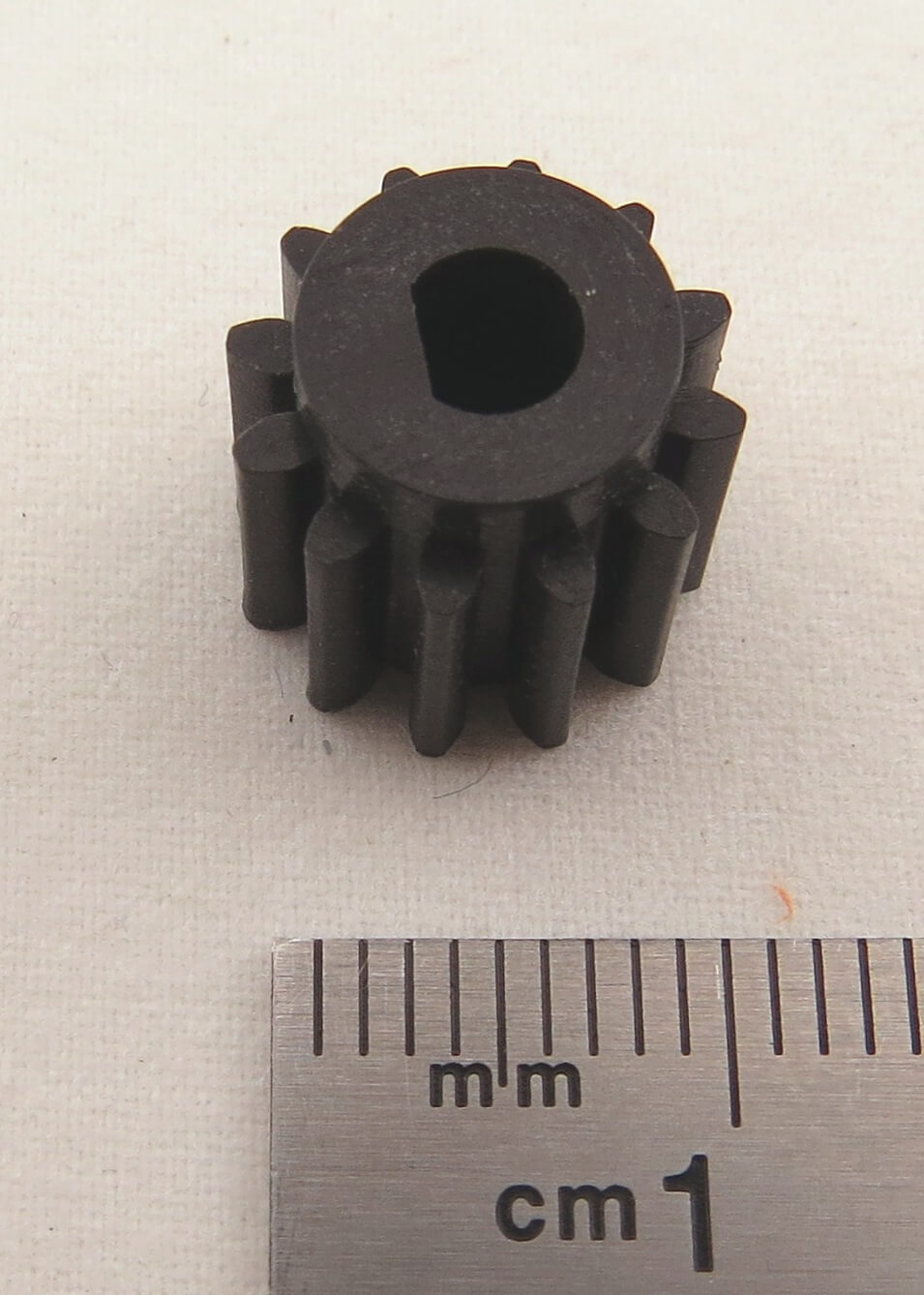 1x Motorritzel, 12 Zähne, Kunststoff.    Zahnrad-Breite 11mm