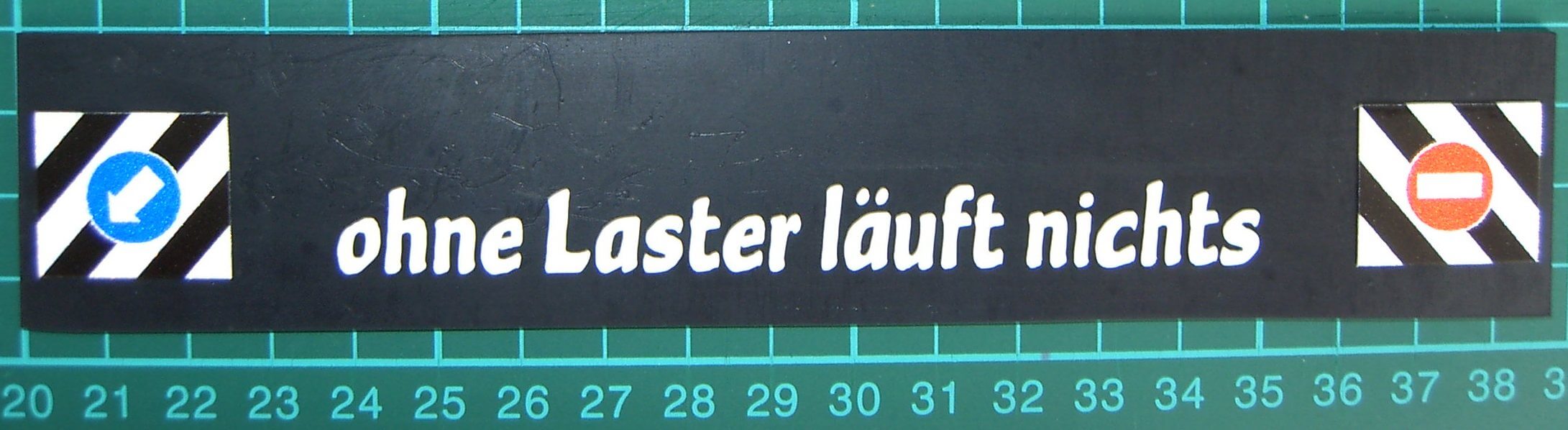 1 Schmutzfänger Nr.0 ca. 185x35x1mm mit  geplottetem Text   