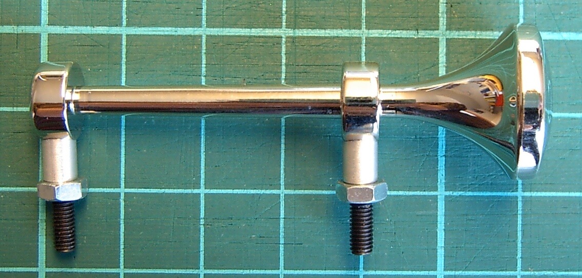 Fanfare 60mm lang, vernickelt, mit Befestigungsmaterial Fanfare 60mm lang, vernickelt, mit Befestigungsmaterial