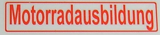 Textschild "Motorradausbildung",rot,1:10 selbstklebende Textschild "Motorradausbildung",rot,1:10 selbstklebende