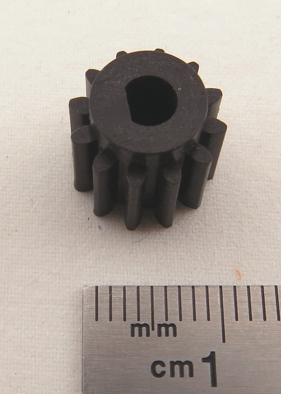 Engrenage / pignon moteur plastique 12 dents axe 2 mm Ø 8,4 mm h=5 mm M 0.6